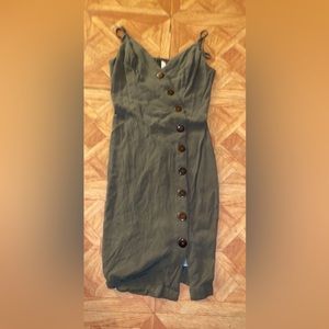 This is a green dress. It was barely ever worn so its still in good condition.